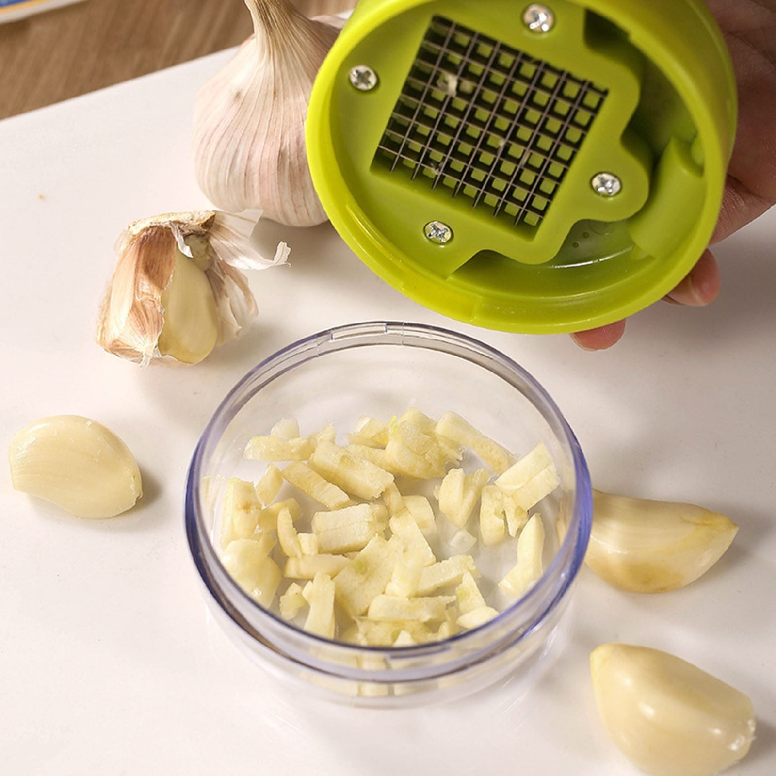Multi Functional Manual Garlic Press and Mincer Tool, Integrated Slicer Dicer Grater and Storage Container, Portable ... - Image 4