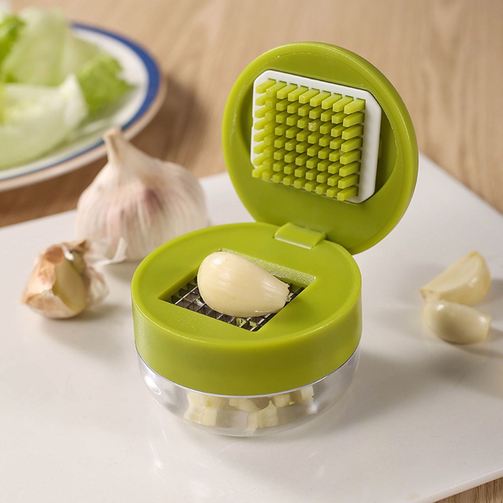 Multi Functional Manual Garlic Press and Mincer Tool, Integrated Slicer Dicer Grater and Storage Container, Portable ... - Image 2